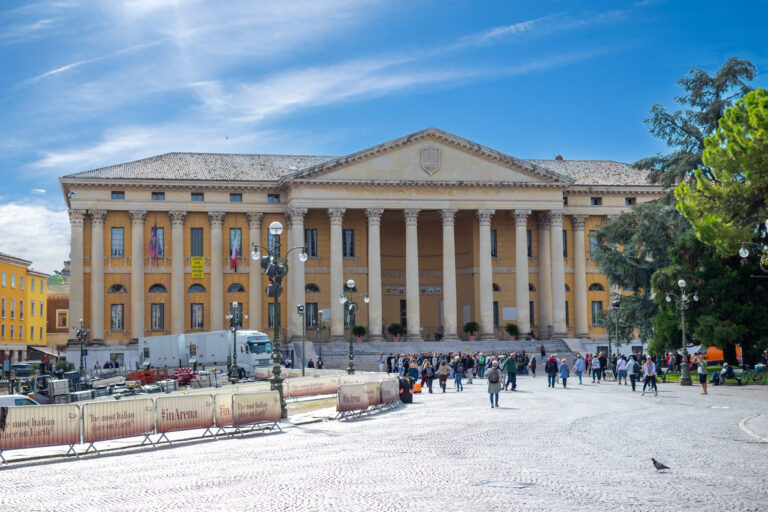 Italy, Verona - October 1st, 2025: Palazzo Barbieri, a neoclassical building with grand columns and elegant symmetry, serving as Verona City Hall and standing beside the historic Arena in Piazza Bra