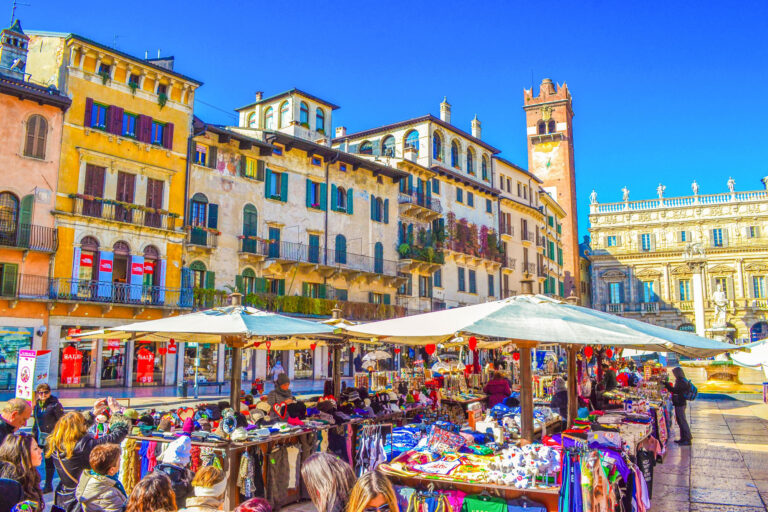 Verona,Veneto,Italy-February 9th 2015:A view of Piazza delle Erbe Market's square -the main square in the historic center of Verona lined with picturesque medieval monuments and  landmarks